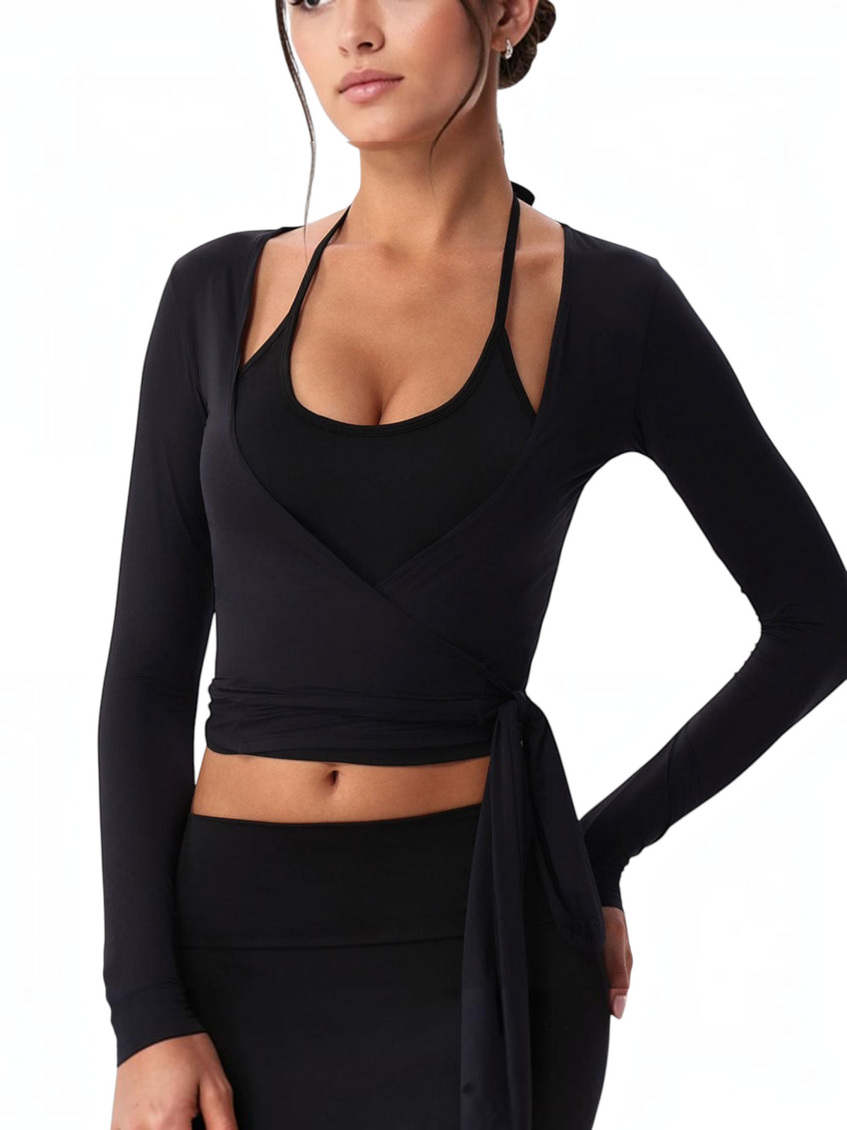 Woman wearing the Wrap Cover-Up — black long-sleeve wrap top with a deep V front and waist ties.