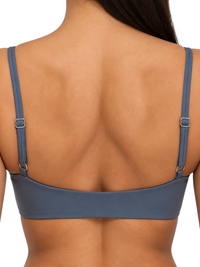 Back view of Ninety Nine crop top in dark purple with slim adjustable straps and fitted nylon spandex fabric