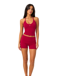 Ninety Nine Cherry Pulse Set featuring a cherry red racerback crop top and matching high-waisted athletic shorts.