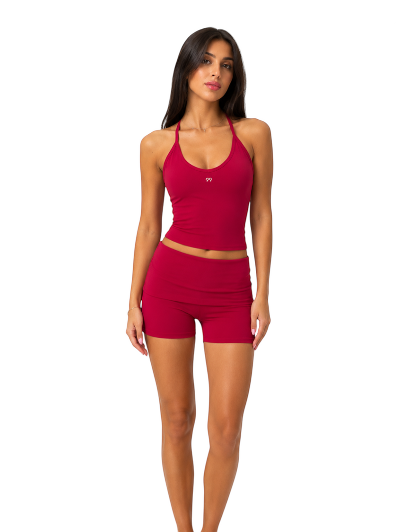 Ninety Nine Cherry Pulse Set featuring a cherry red racerback crop top and matching high-waisted athletic shorts.