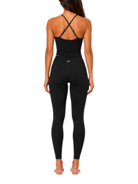 Ninety Nine Black Tempo Set featuring a sculpting tank top with cross-back straps and matching high-waisted leggings.